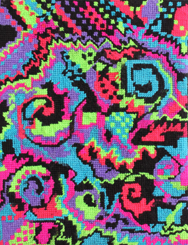 Brightly coloured abstract needlework in pink, purple, blue, green, and black