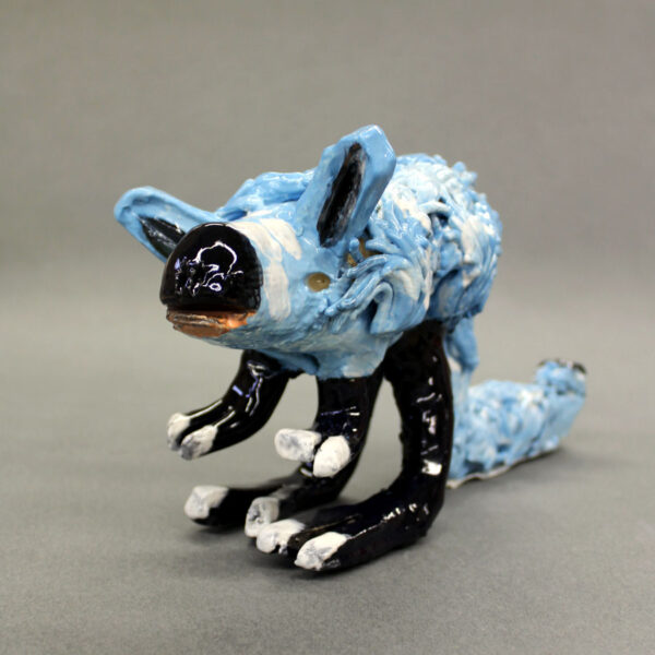 Ceramic sculpture of a blue kangaroo rat with black feet and nose