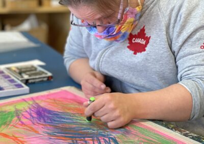 Sarah Dans using pastel on fabric