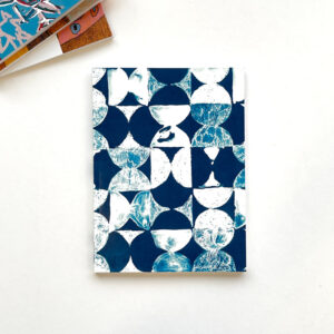 Notebook with blue patterned cyanotype on the cover