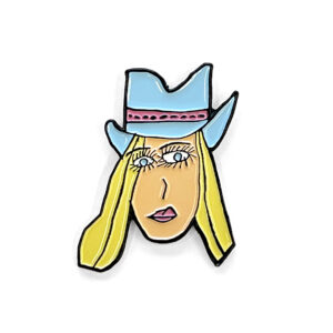 Enamel pin of cowgirl with blonde hair and blue hat