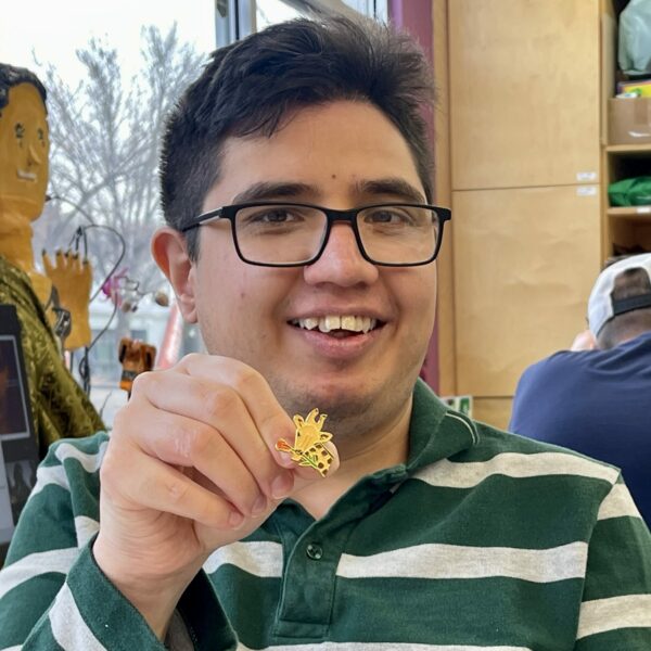 Tim and his giraffe pin