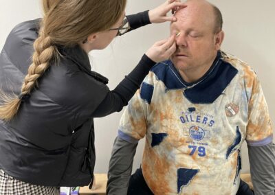 Dale getting his makeup done by Rin backstage