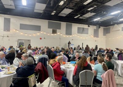Alberta Ave Community Centre full of guests at the Patrons Lunch