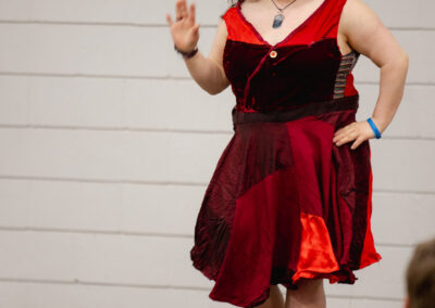 Alana walking the runway in a dress she made